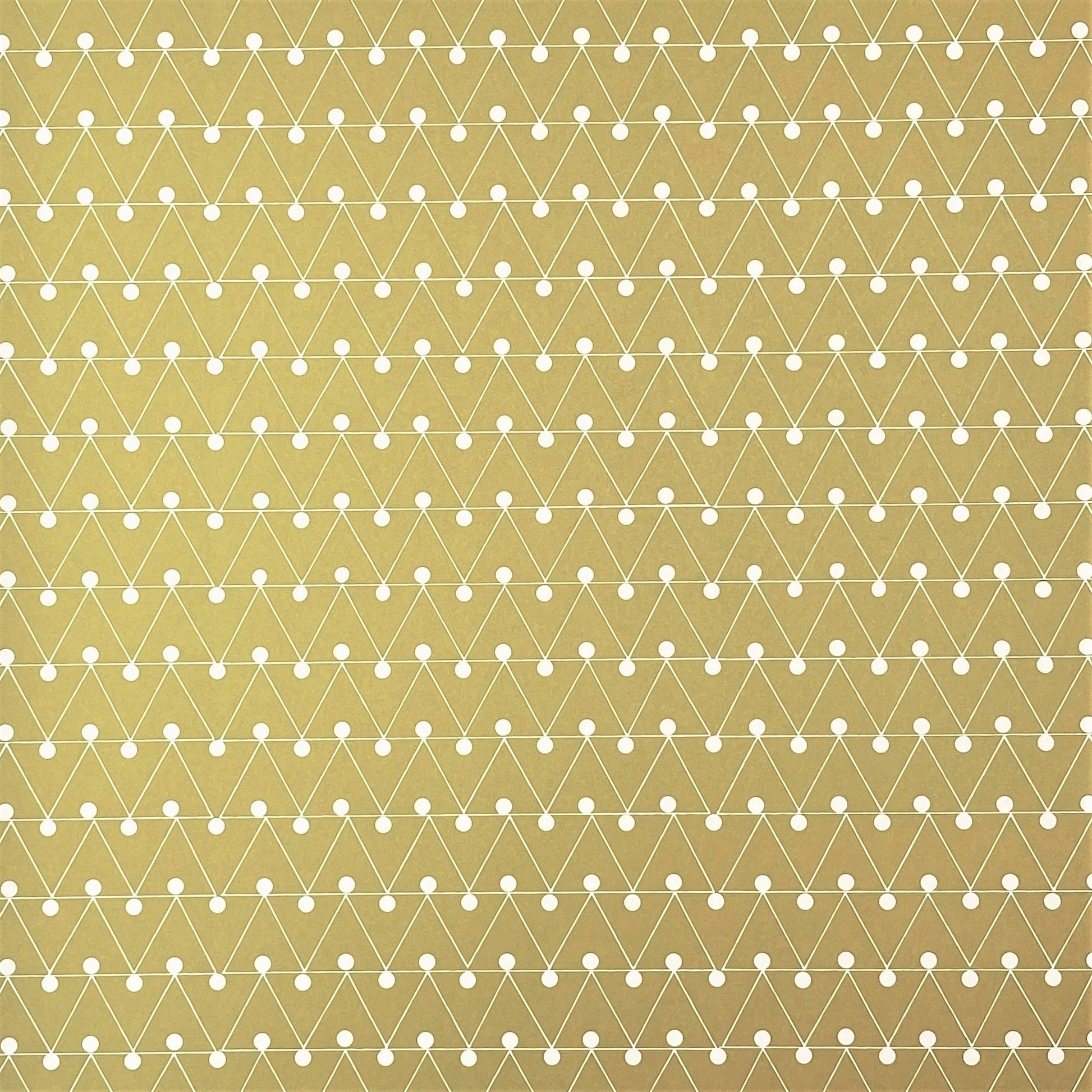 wrapping paper with abstract triangle and dot pattern in mustard and white by Ola Studio