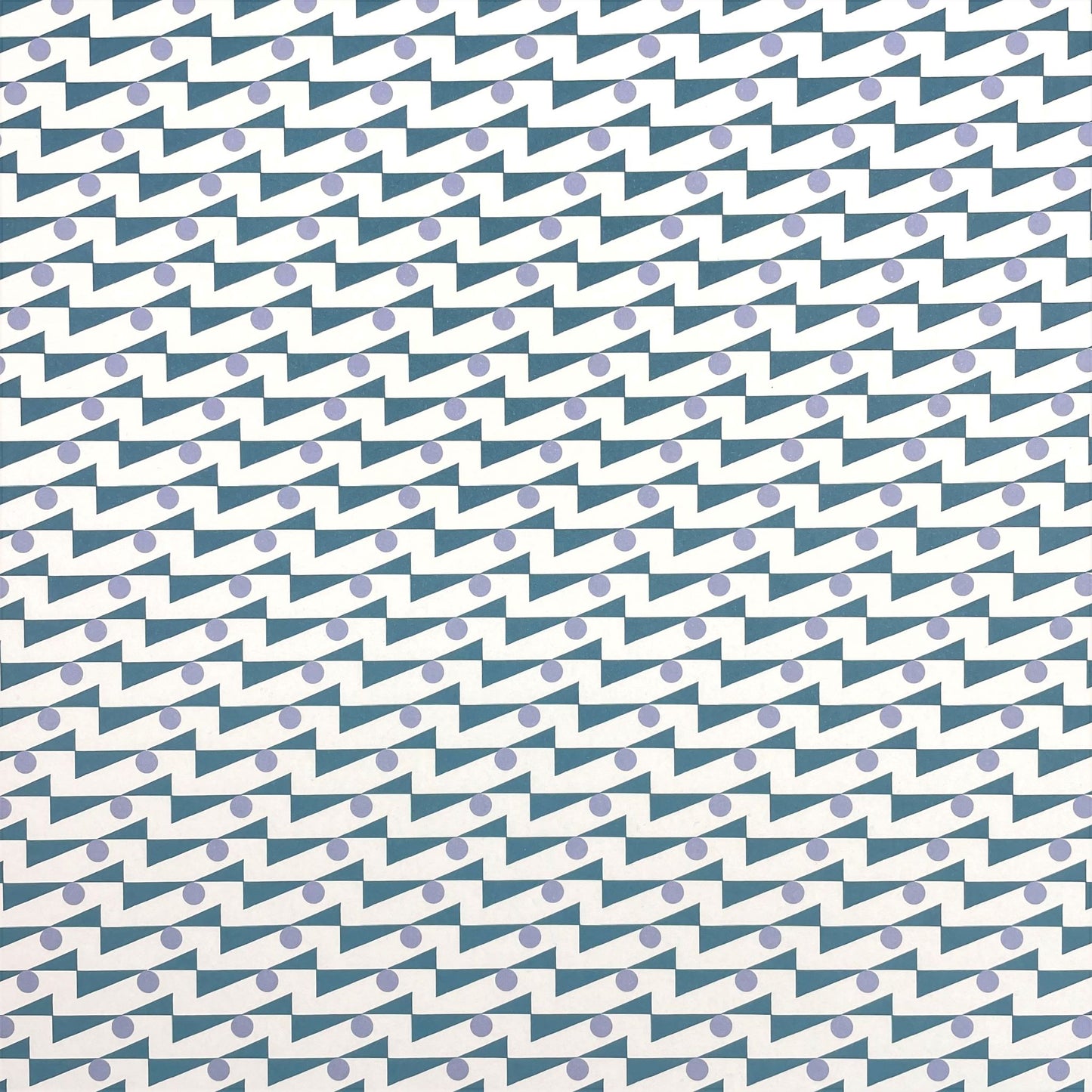 wrapping paper with abstract triangle and dot pattern in blue and lilac by Ola Studio