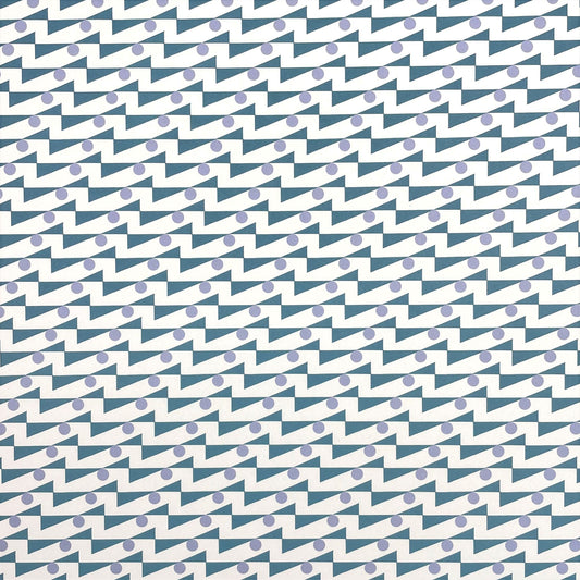 wrapping paper with abstract triangle and dot pattern in blue and lilac by Ola Studio