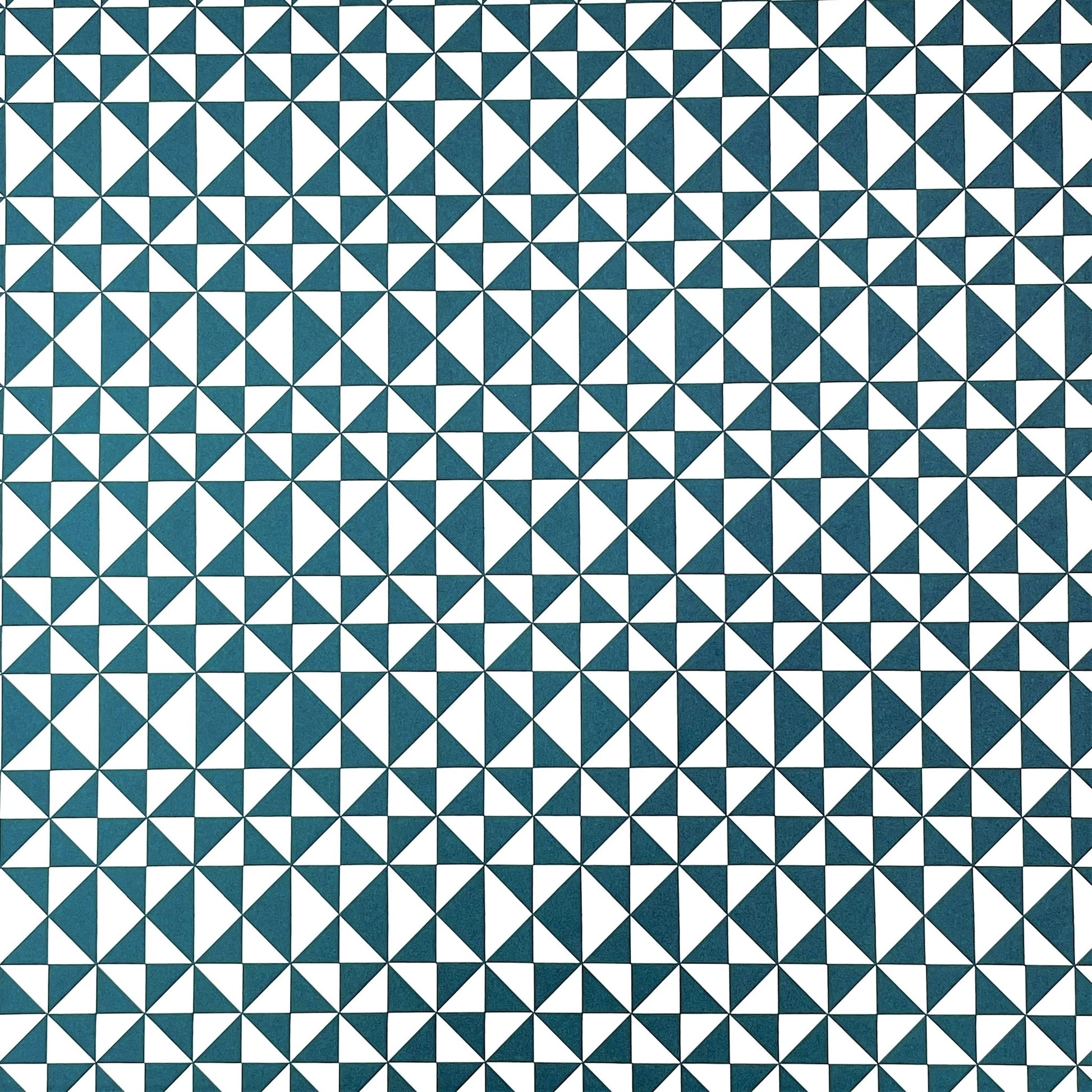 wrapping paper with an abstract triangle pattern in deep teal and white by Ola Studio