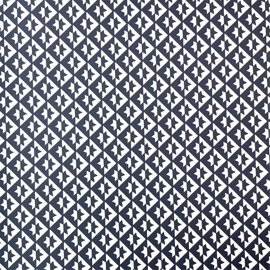 wrapping paper with an abstract star pattern in dark navy and white by Ola Studio