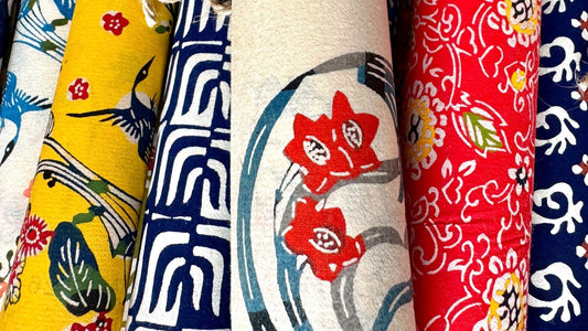 rolls of colourful patterned Japanese stencil-dyed papers