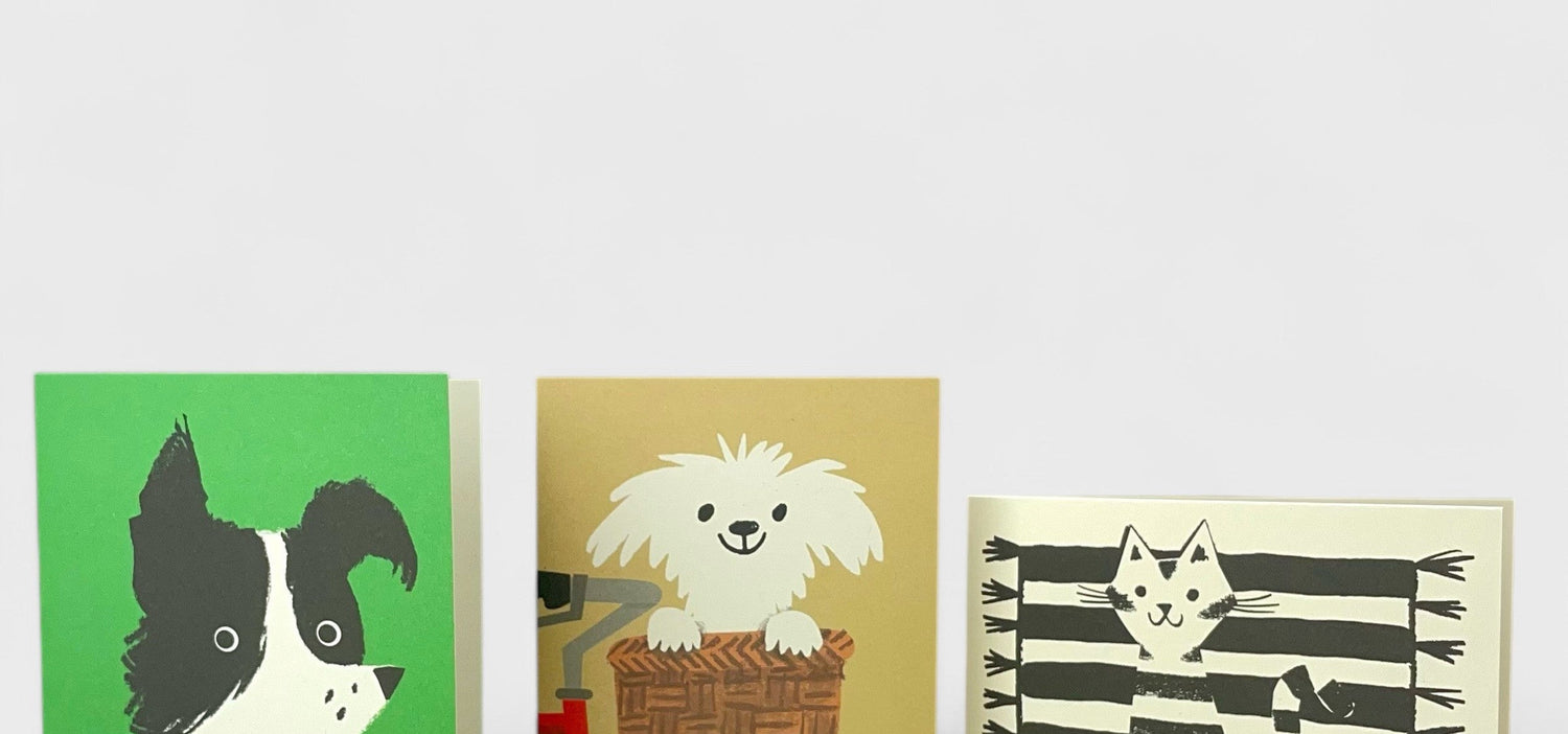 close up of three greetings cards with cute animals drawn by Lisa Jones Studio