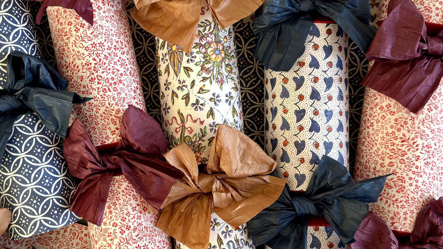 presents wrapped with colourful Japanese paper string