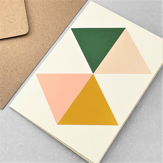 Greeting card with green, mustard, pink abstract triangles by Amaretti Design