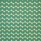 wrapping paper by Anne Davison Studio. Bold green wiggle lines with a retro vibe on beige backdrop.