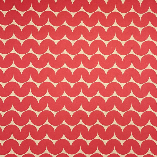 wrapping paper by Anne Davison Studio.  Bold red wiggle lines with a retro vibe on beige backdrop.