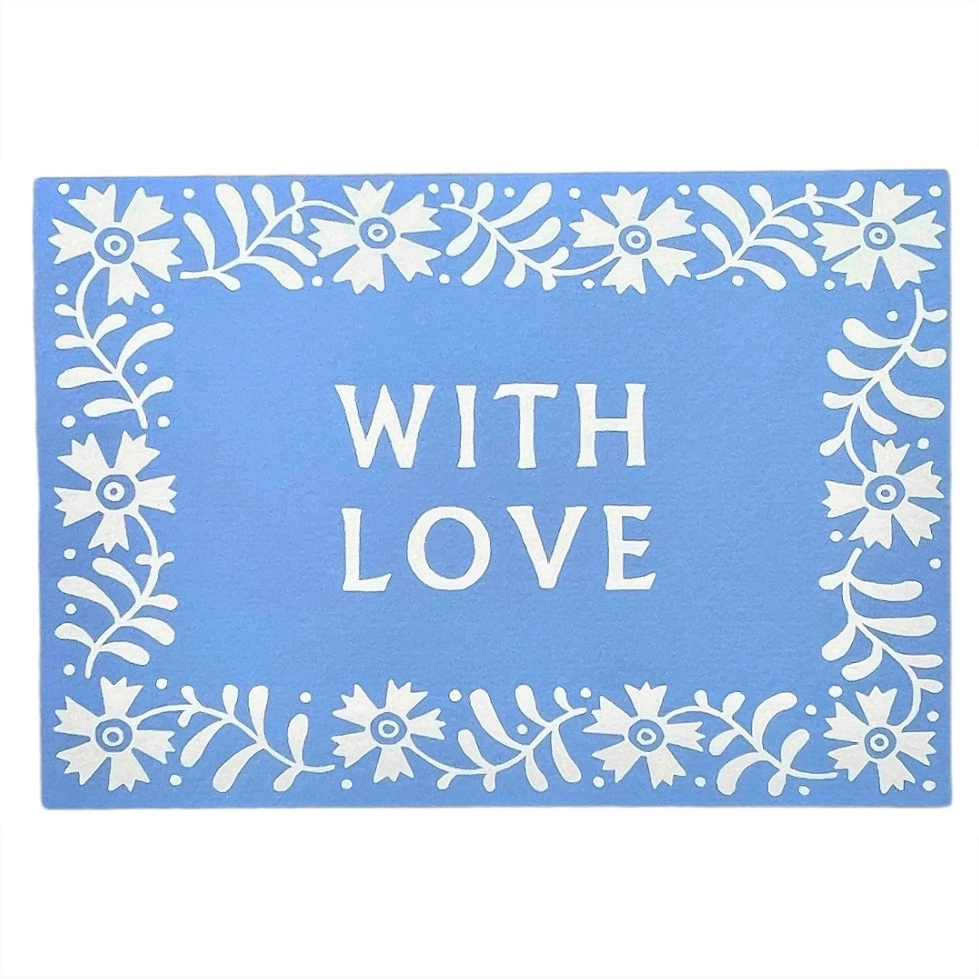 Greetings card with the words WITH LOVE, a white floral border on a blue background. Card by Ariana Martin