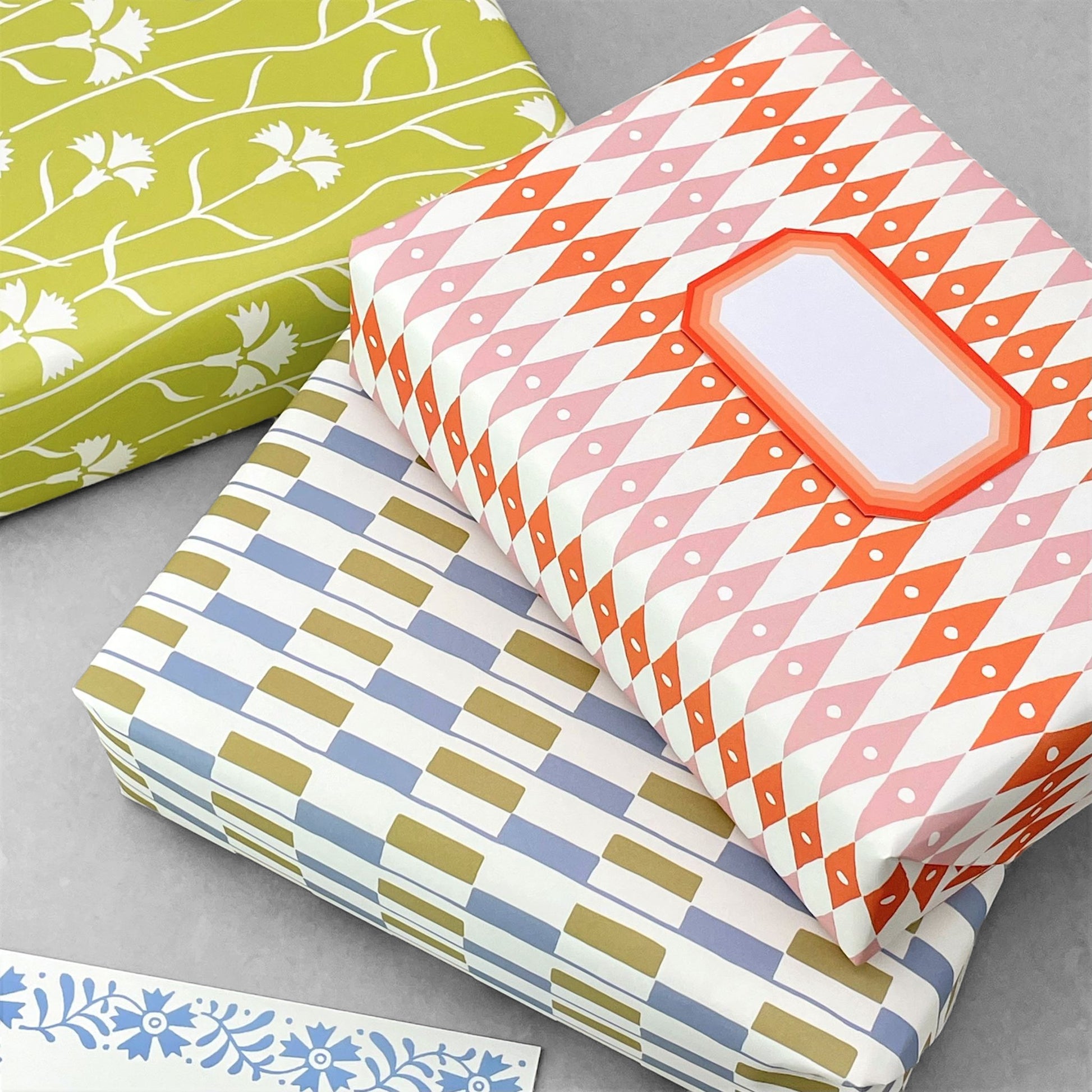 patterned paper, gift wrap with a white cornflower repeat pattern on soft lime green backdrop, by Ariana Martin