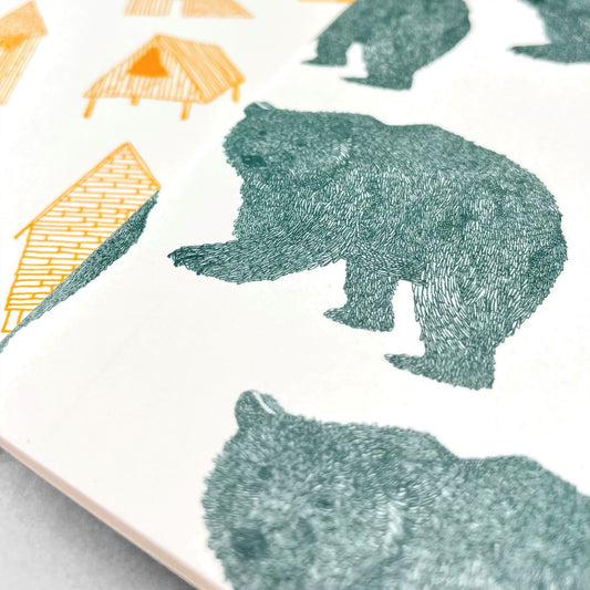 A5 slimline notebook with a delicate illustration of bears in teal on a ivory backdrop by Parisian brand Atelier Mouti