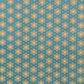 a sheet of wrapping paper with a repeat pattern of stylised brown flowers on a teal green background