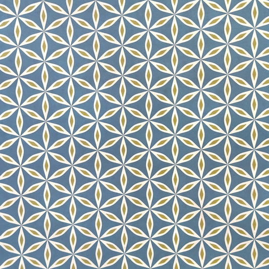 geometric wrapping paper with a star flower pattern in white and lime on teal