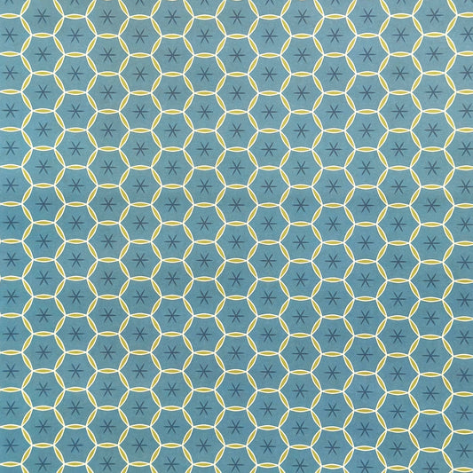 abstract wrapping paper with a geometric circle pattern with a star in the middle in teal blue and lime green