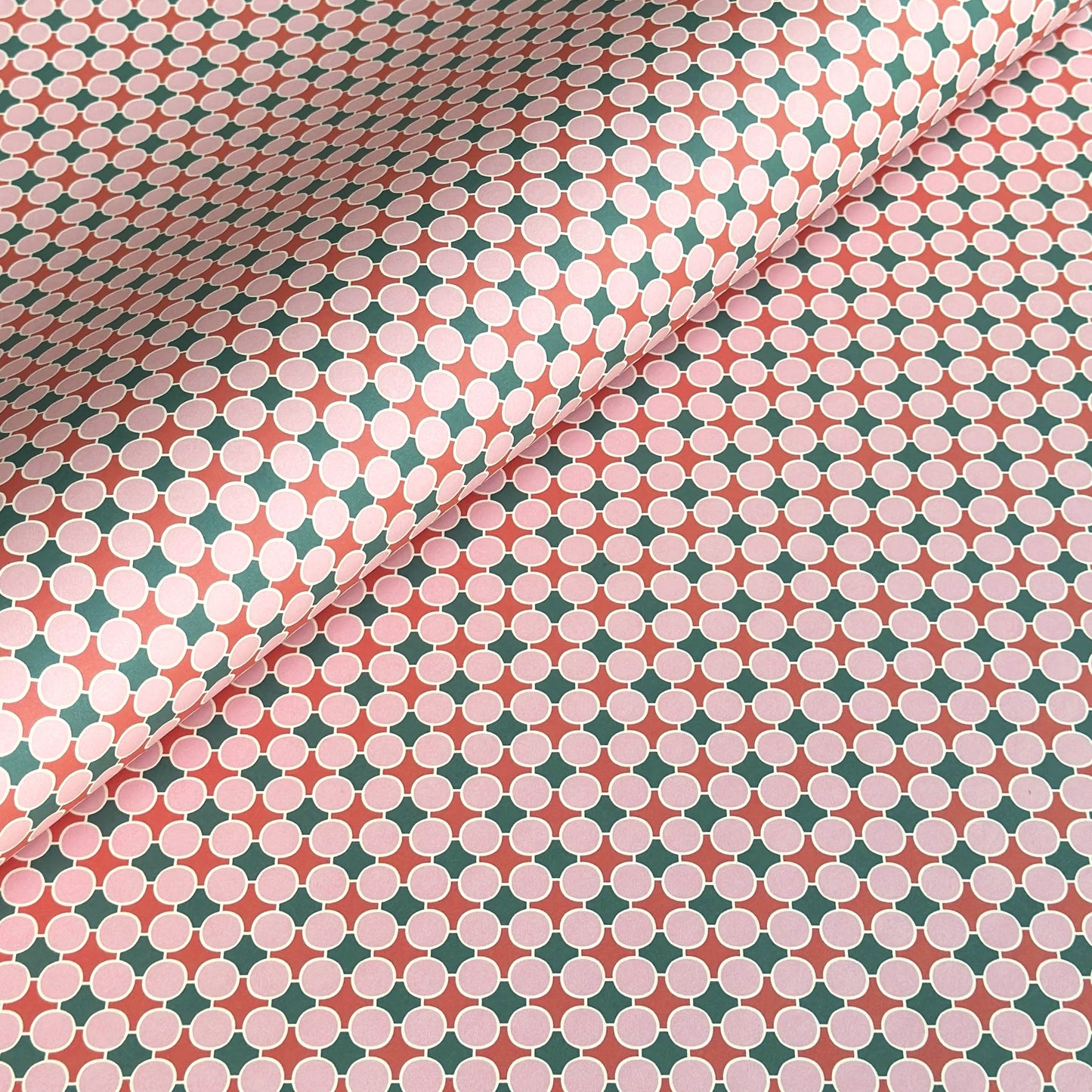 Patterned paper with pink, red and green geometric design