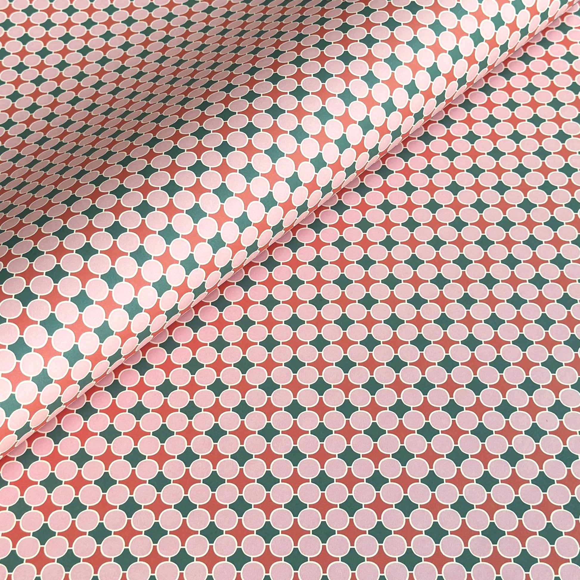 Patterned paper with pink, red and green geometric design