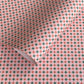 Patterned paper with pink, red and green geometric design