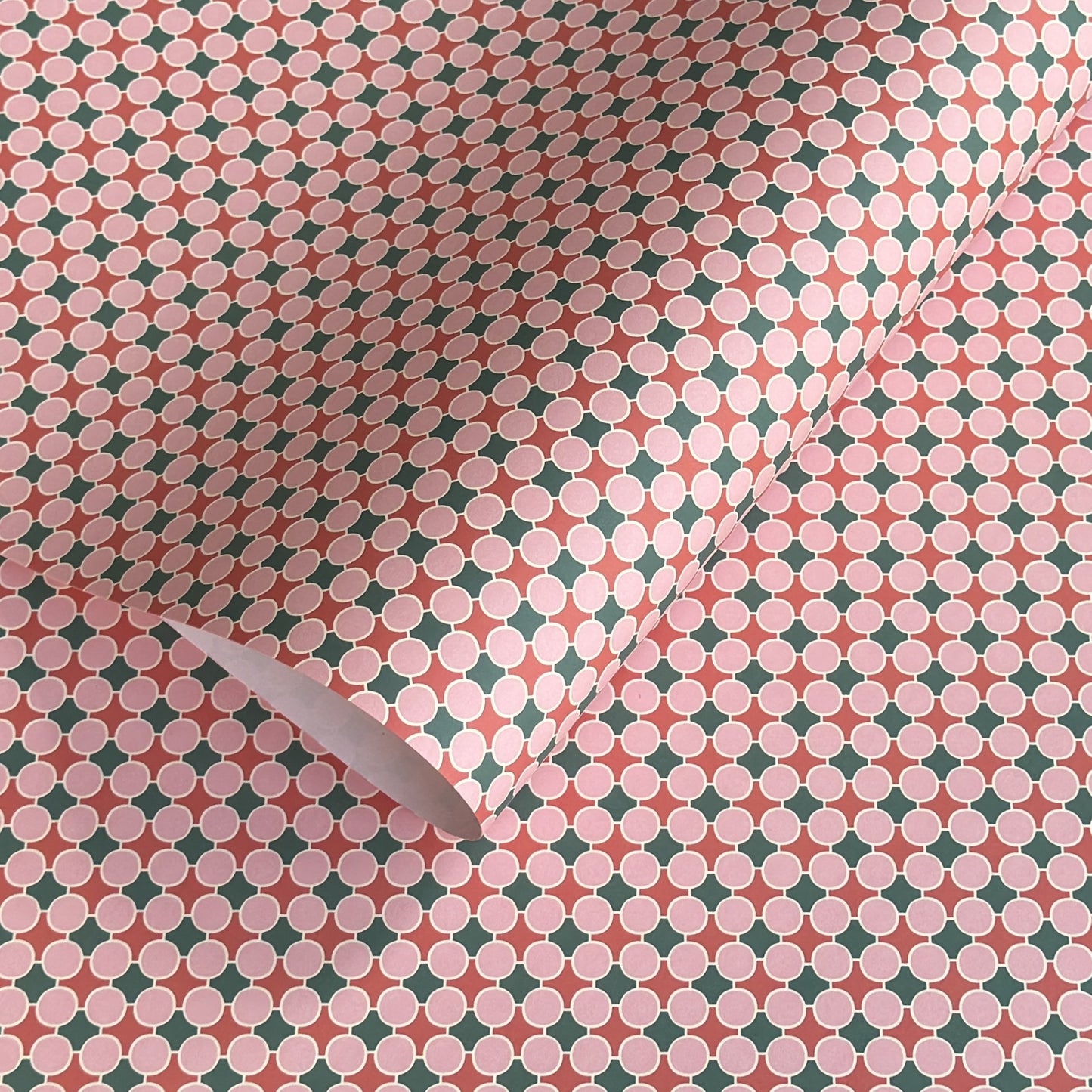 Patterned paper with pink, red and green geometric design