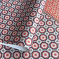 Wrapping paper with a red and blue retro geometric pattern