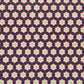 Patterned paper with red, green, and white stars on a blue background