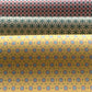 Three rolls of patterned paper with different designs.