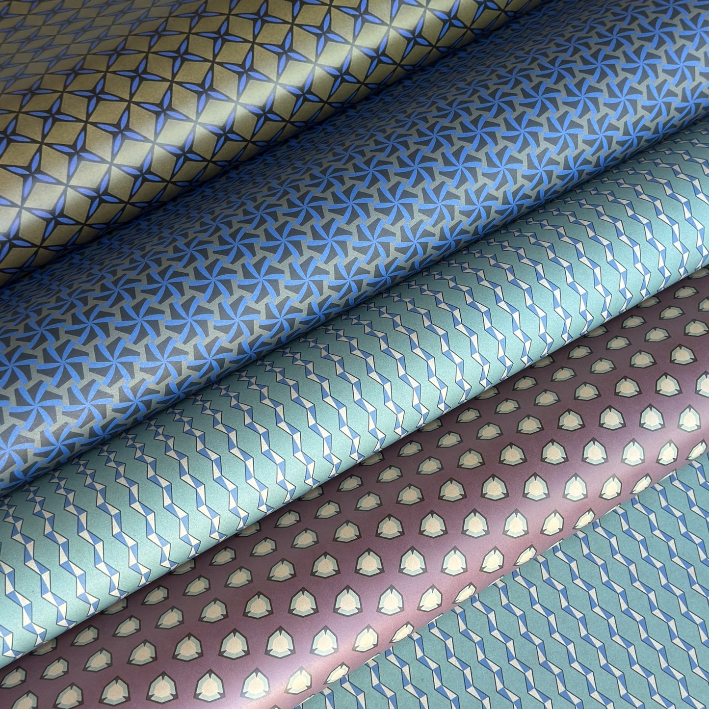 Collection of patterned wrapping papers in various colors