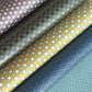 Five patterned wrapping papers with geometric designs.