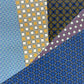 Collection of various geometric patterned papers in different colors.
