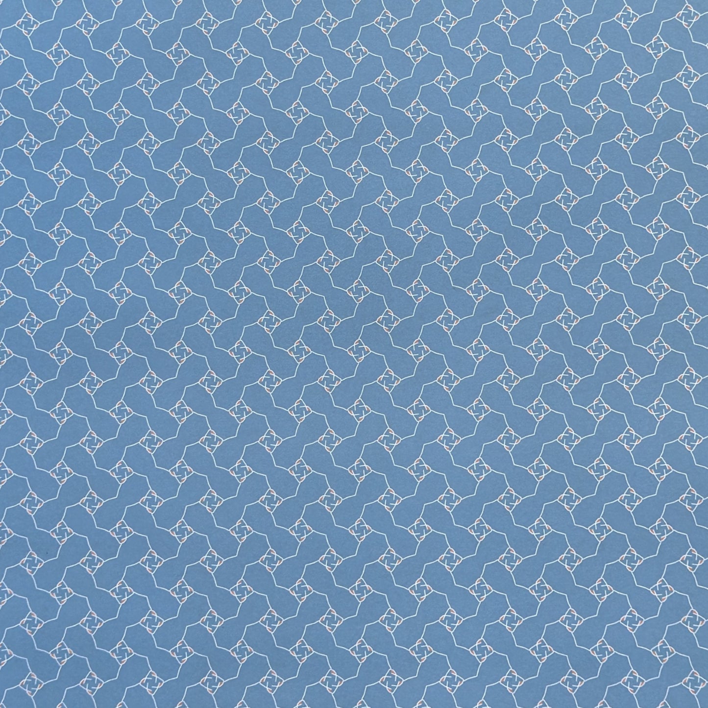 Blue patterned paper with a geometric design
