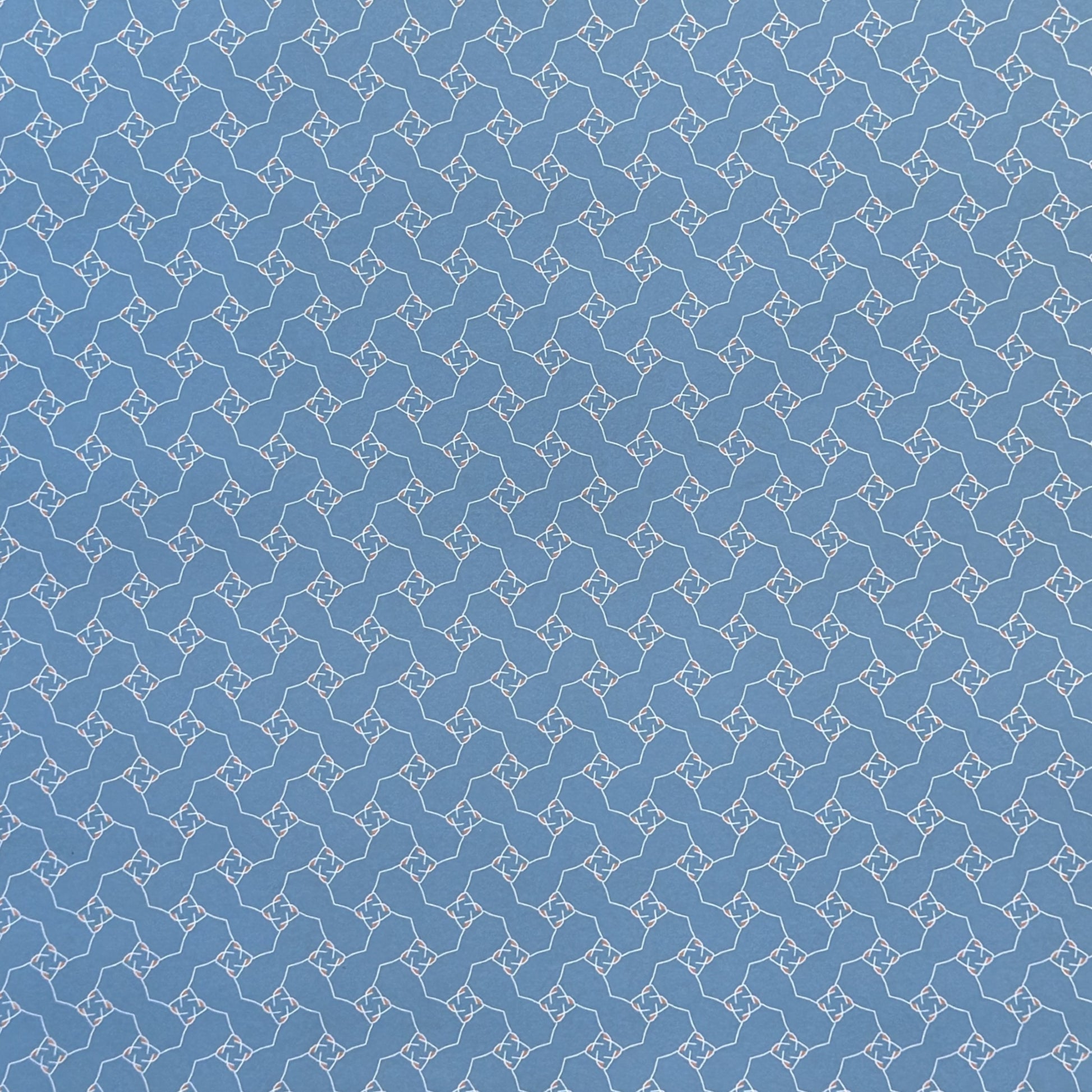 Blue patterned paper with a geometric design