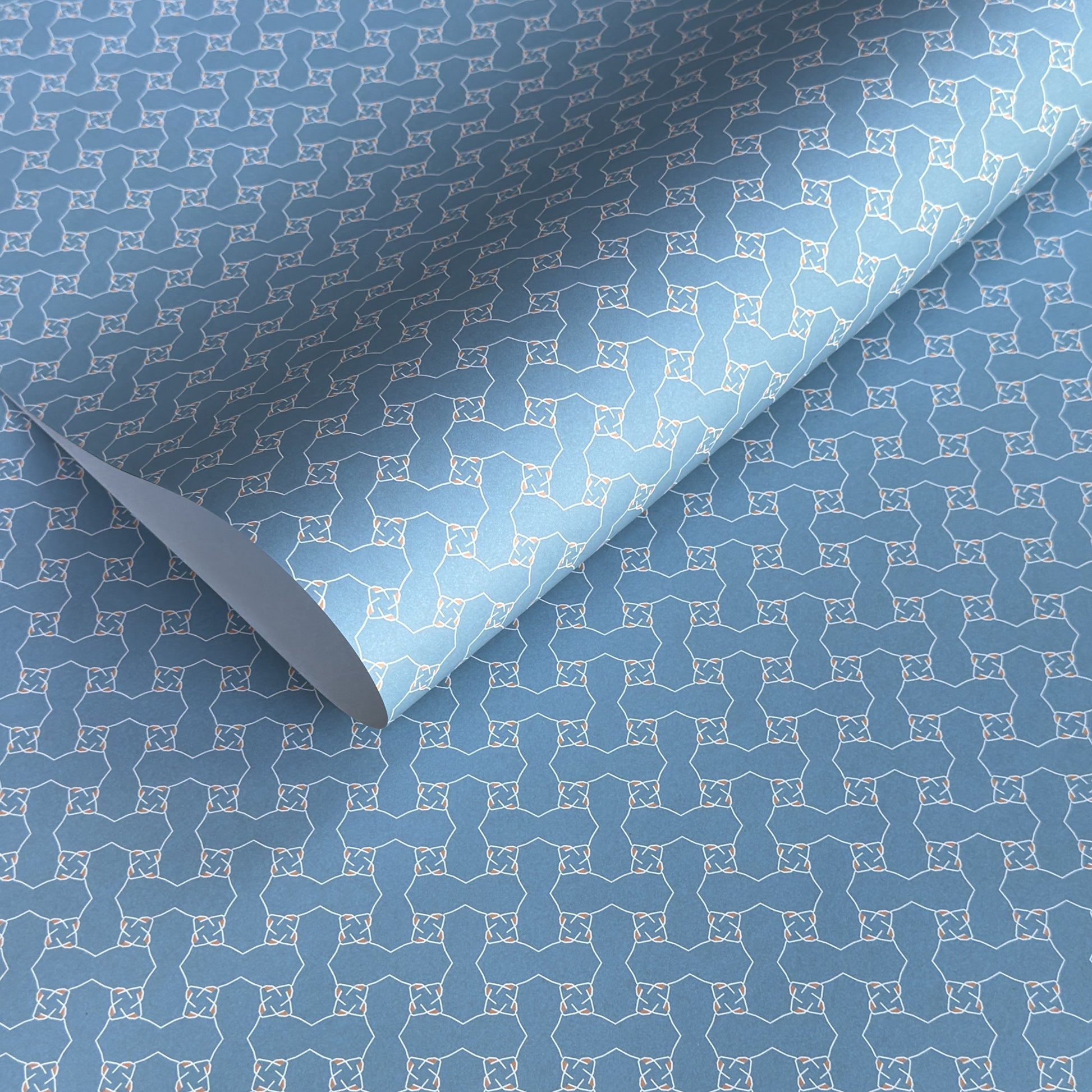 Blue patterned paper with a geometric design