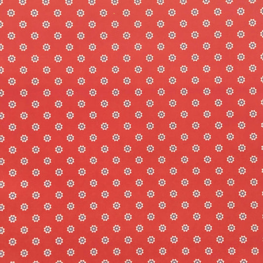Red wrapping paper with white star floral pattern
