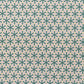wrapping paper with a geometric pattern in green and yellow on beige