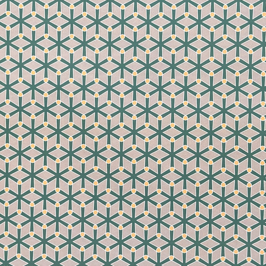 wrapping paper with a geometric pattern in green and yellow on beige