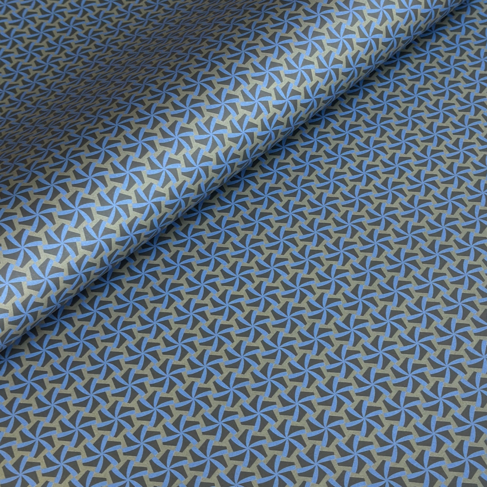 Blue and gray geometric patterned wrapping paper