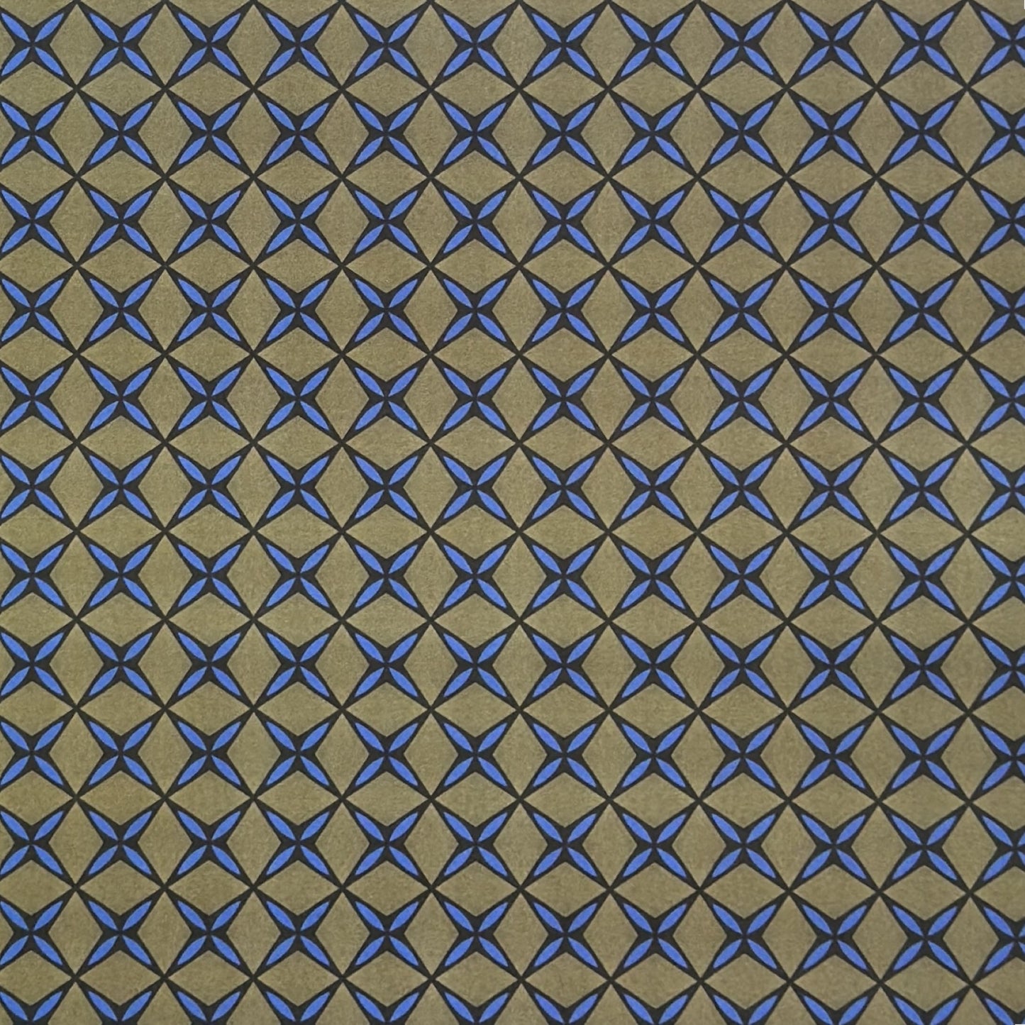 Wrapping paper with blue geometric pattern on a beige background