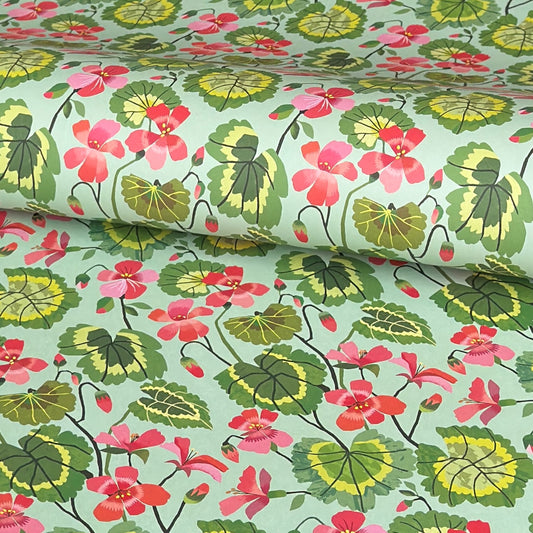 floral geranium patterned wrapping paper in pink, green and aqua.