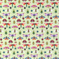 A sheet of wrapping paper with a pattern of colourful butterflies and insects on a light green background