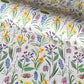 Patterned paper with colourful spring flowers and bees on a ivory background