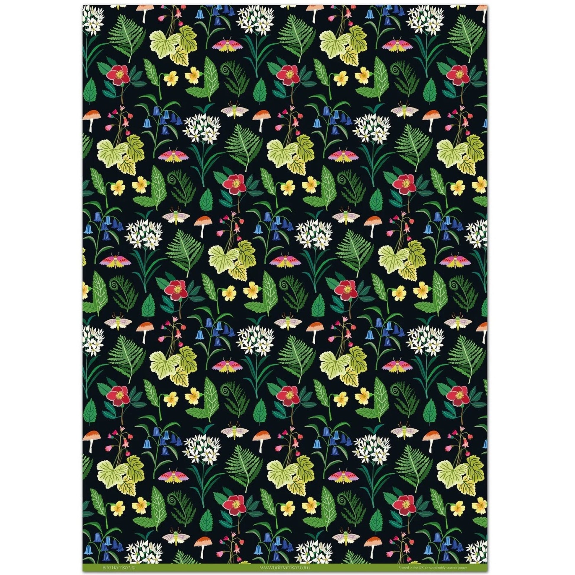  a sheet of wrapping paper with a black background and multl-colour flowers and fauna  from a woodland in bright colours