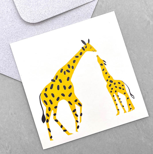 greetings card showing yellow mother and baby giraffes by Canns Down Press