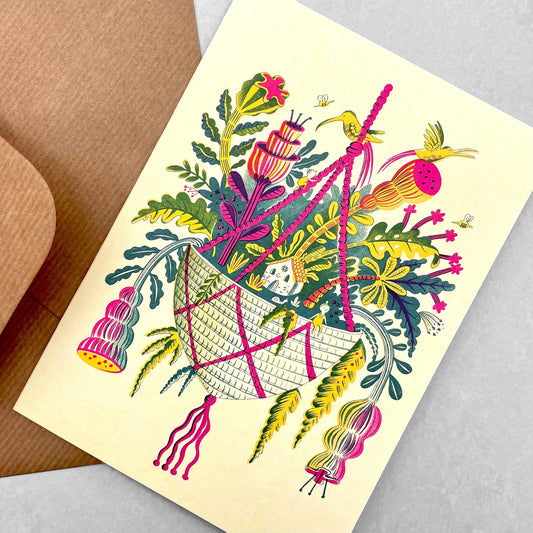 greetings card showing a hanging basket with a mythical botanical world inside by Canns Down Press