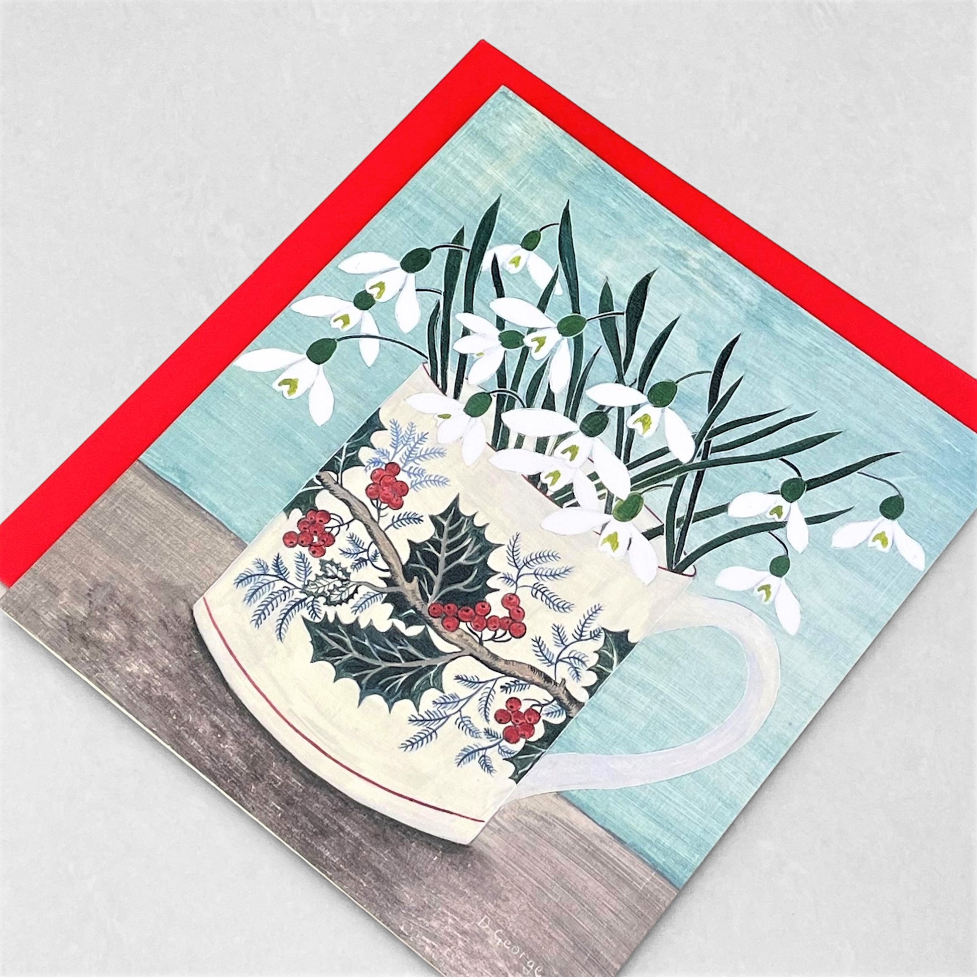 greetings card showing a decorated cup with snowdrops inside by Canns Down Press