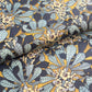 wrapping paper with a stylised design of sweet chestnut flowers in blue and yellow