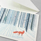 greetings card of a fox in a winter forest by Com Bossa Studio