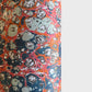 a printed marbled design wrapping paper in blue, orange and pink, by Compton Marbling