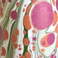 printed marbled design gift wrap with a marbled spot design in green, pink and orange.  By Compton Marbling