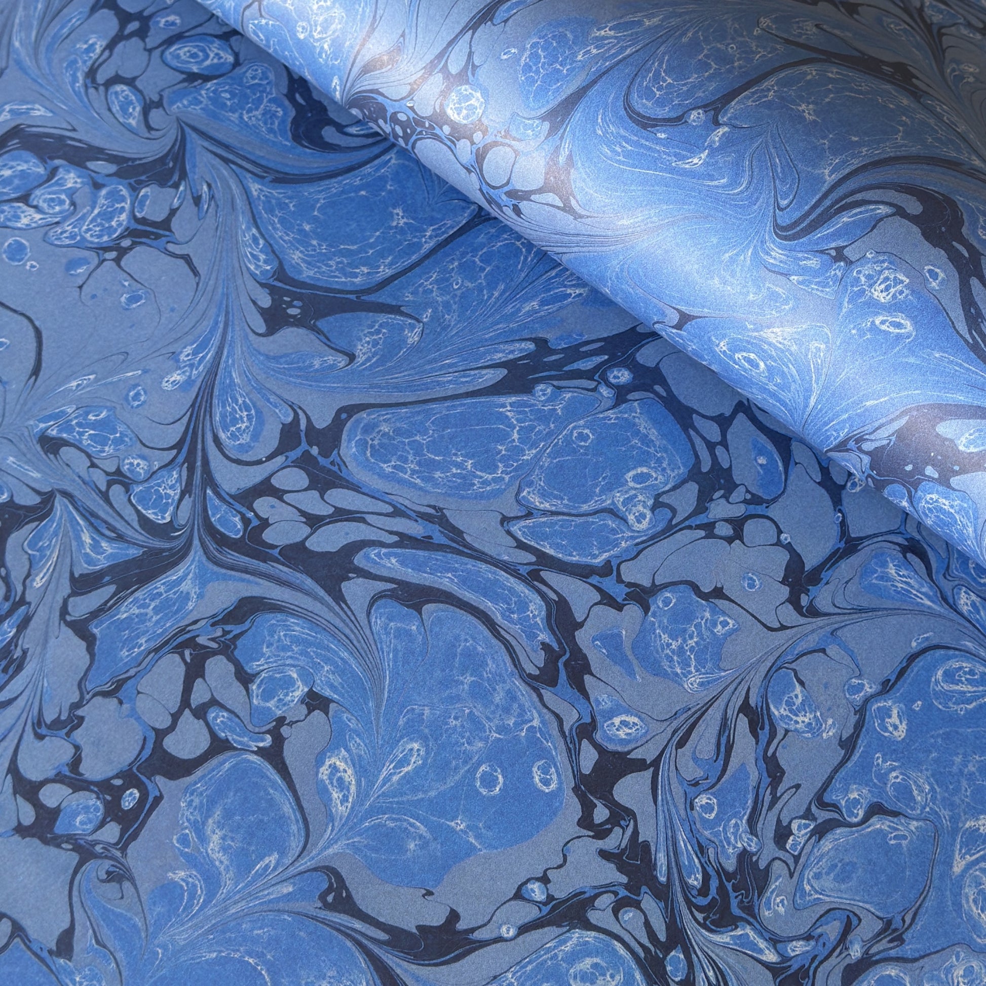 a blue printed marble  wrapping paper from Compton Marbling