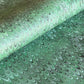 a green printed marbled wrapping paper by Compton Marbling