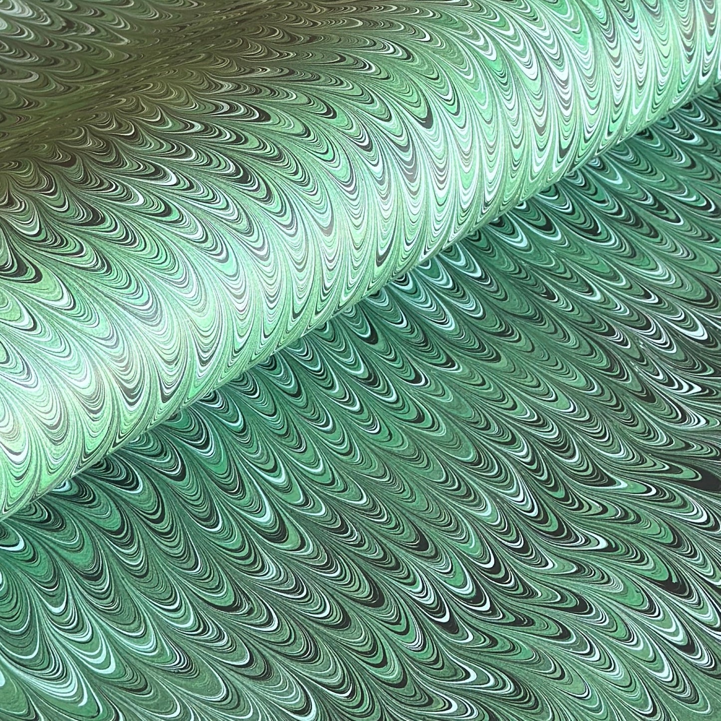 a green printed marbled wrapping paper by Compton Marbling