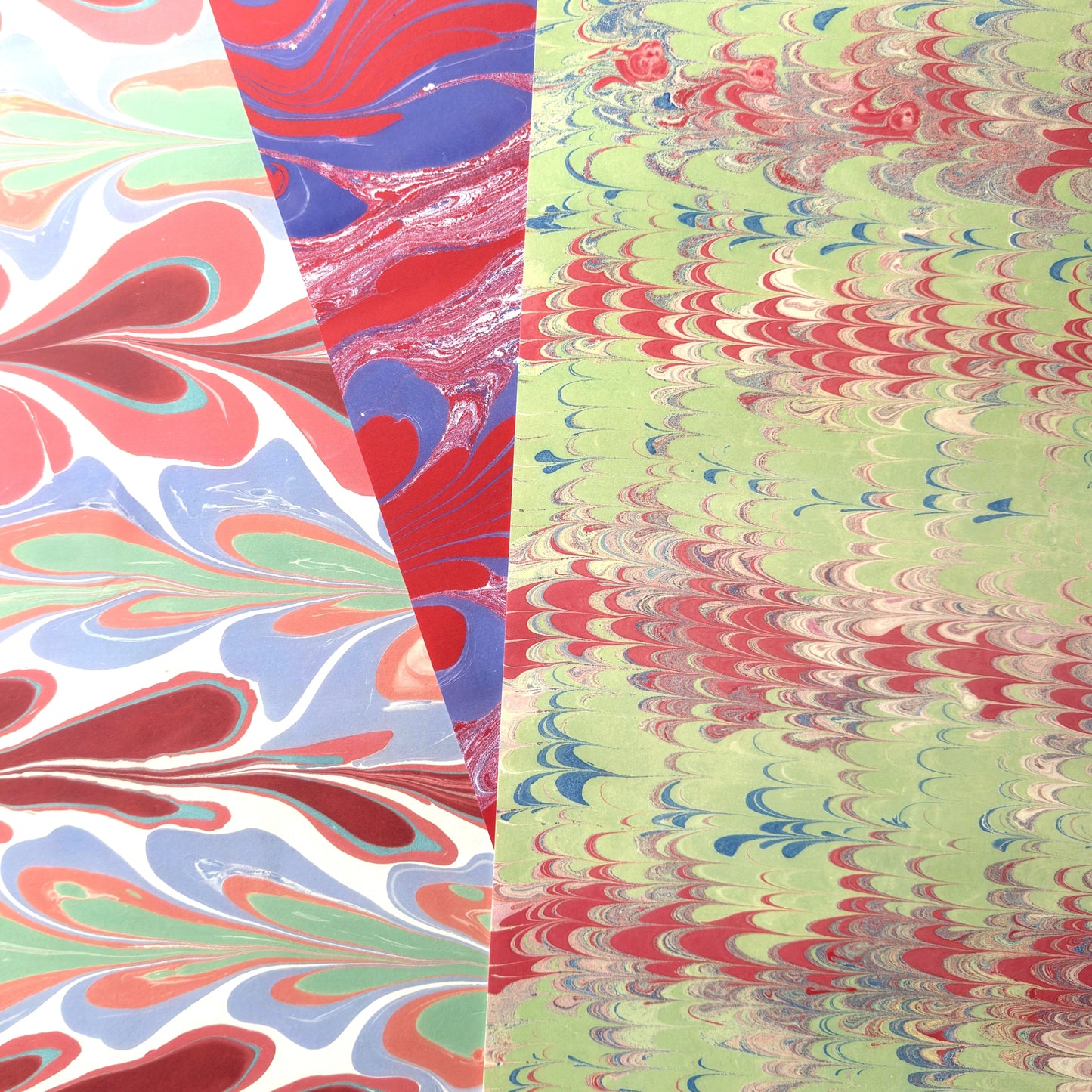 swatches of three printed marbled papers by Elizabeth Harbour from the Danby Press